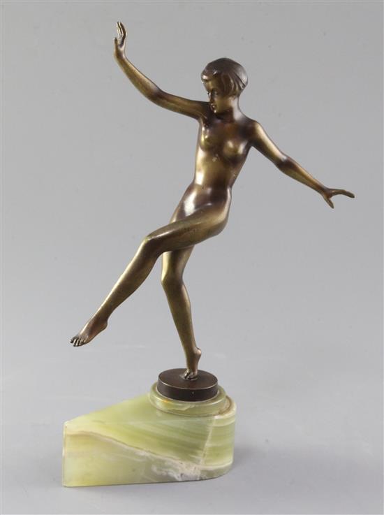 A Lorenzl Art Deco bronzed figure of a nude dancing girl, height 11in.